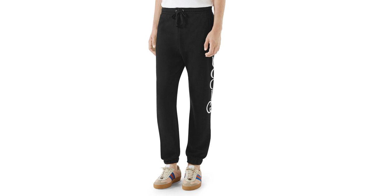 gucci sweatpants black and white