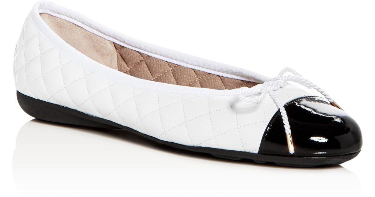 black and white ballet flats