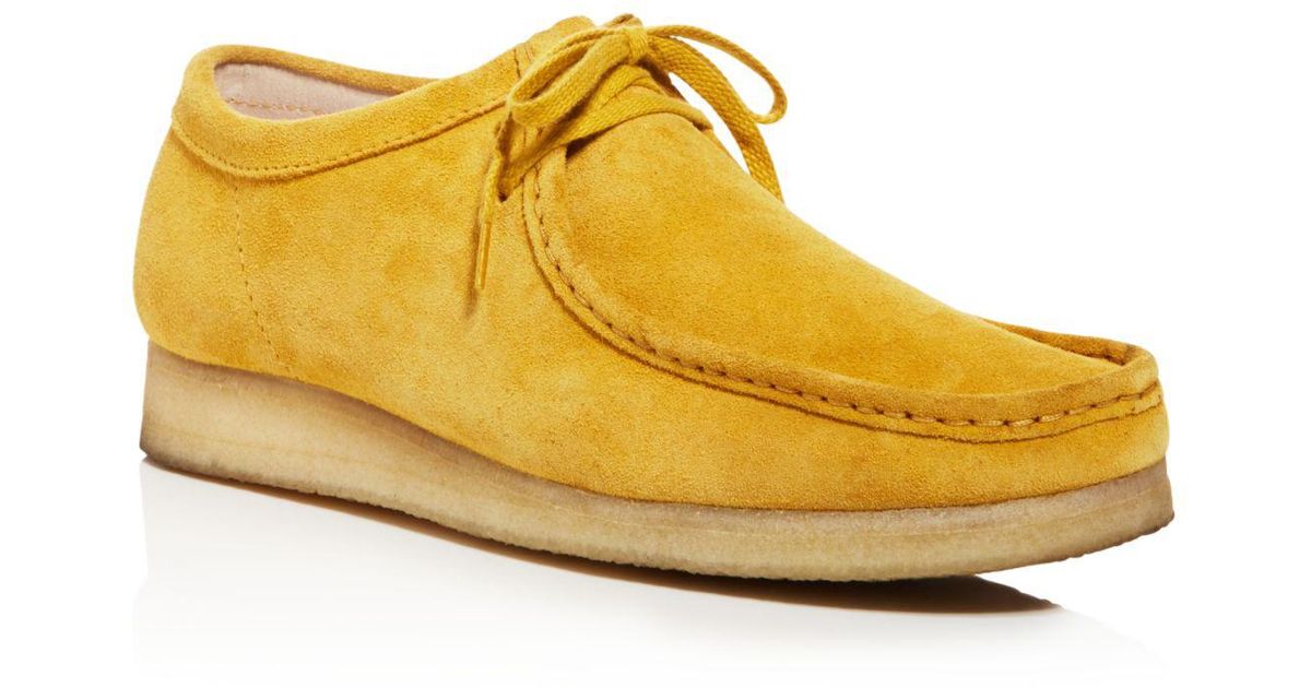yellow clarks wallabees
