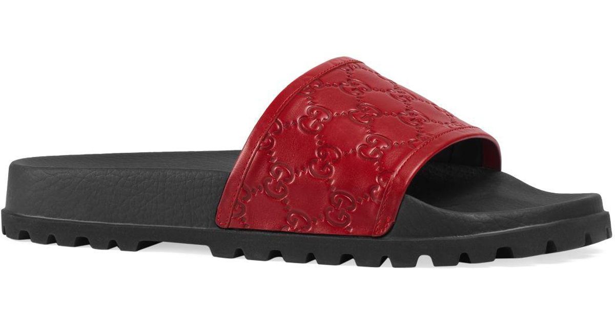 red and black gucci slides