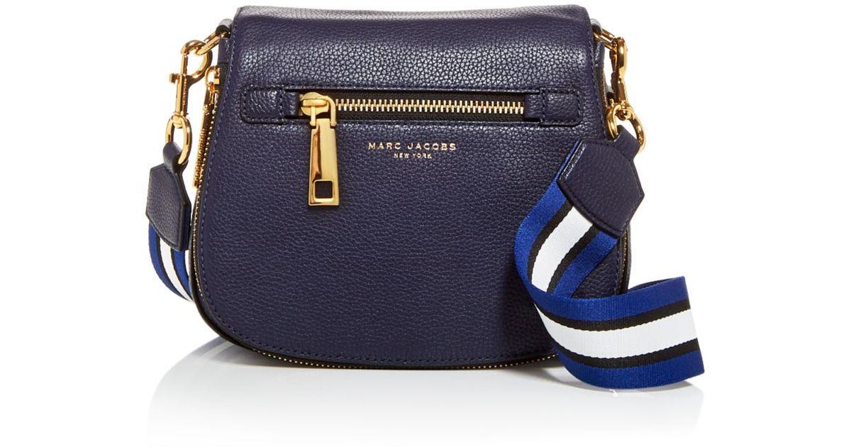 small nomad crossbody bolsa