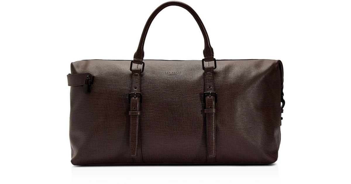 red leather holdall