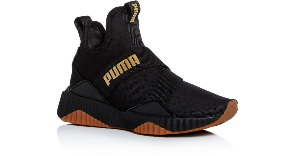 puma defy mid size 11