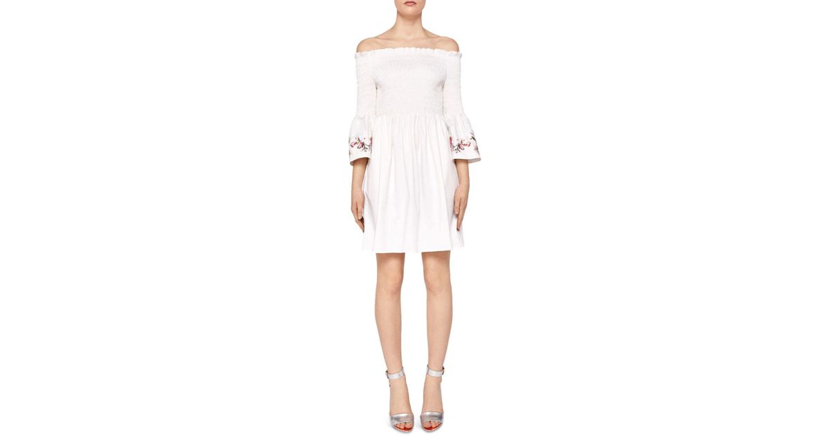 white smocked off the shoulder dress