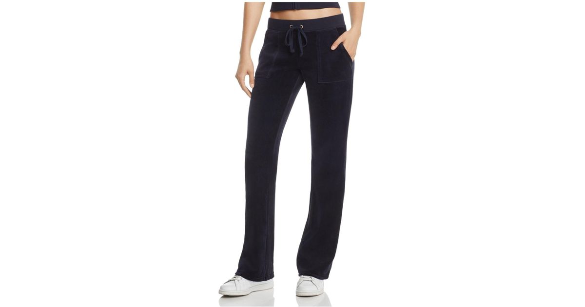 juicy couture track pants with juicy on the bum