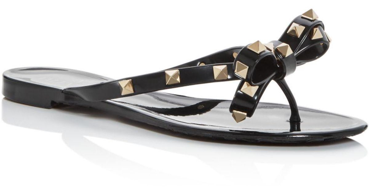 Valentino Garavani Women's Rockstud Bow Flip - Flops in Black - Lyst