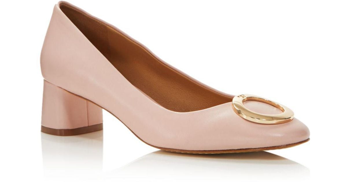 tory burch round toe pumps