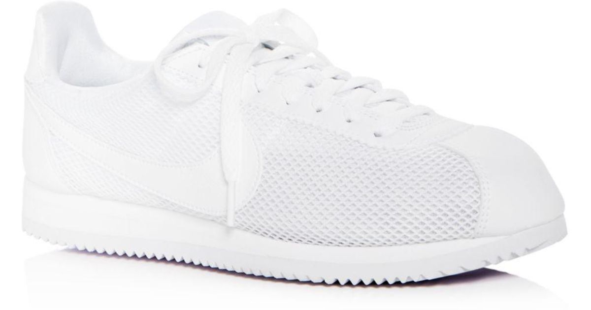 all white cortez womens