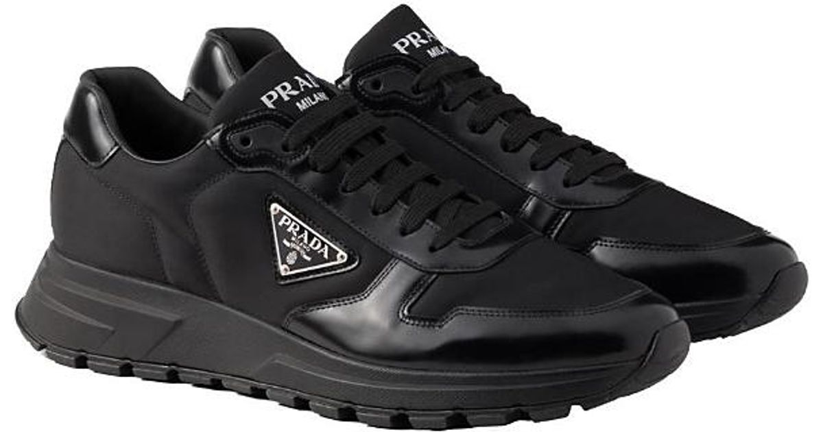 Prada Prax 01 Re-Nylon And Brushed Leather Sneakers in Black for Men | Lyst
