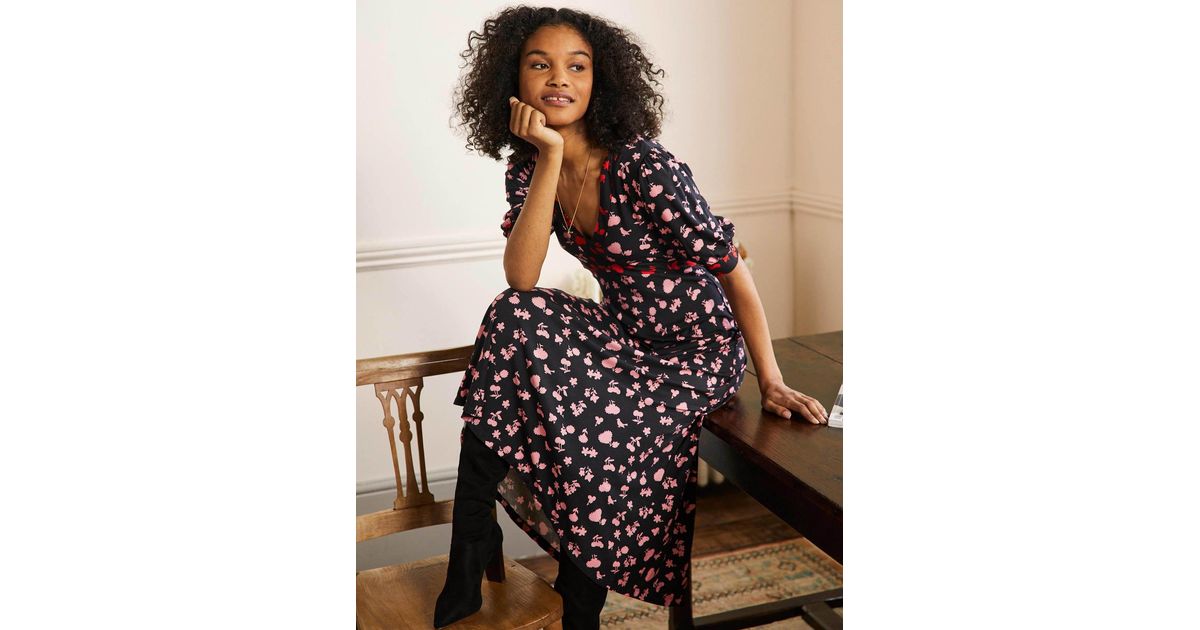 navy blue jersey wrap dress A Feminine Touch Navy Floral Jersey Wrap Dress main image 0
