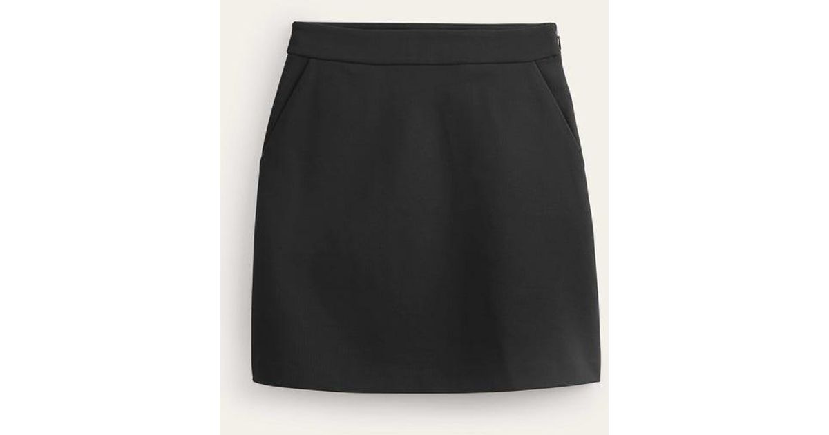 Black jersey a line mini skirt hotsell