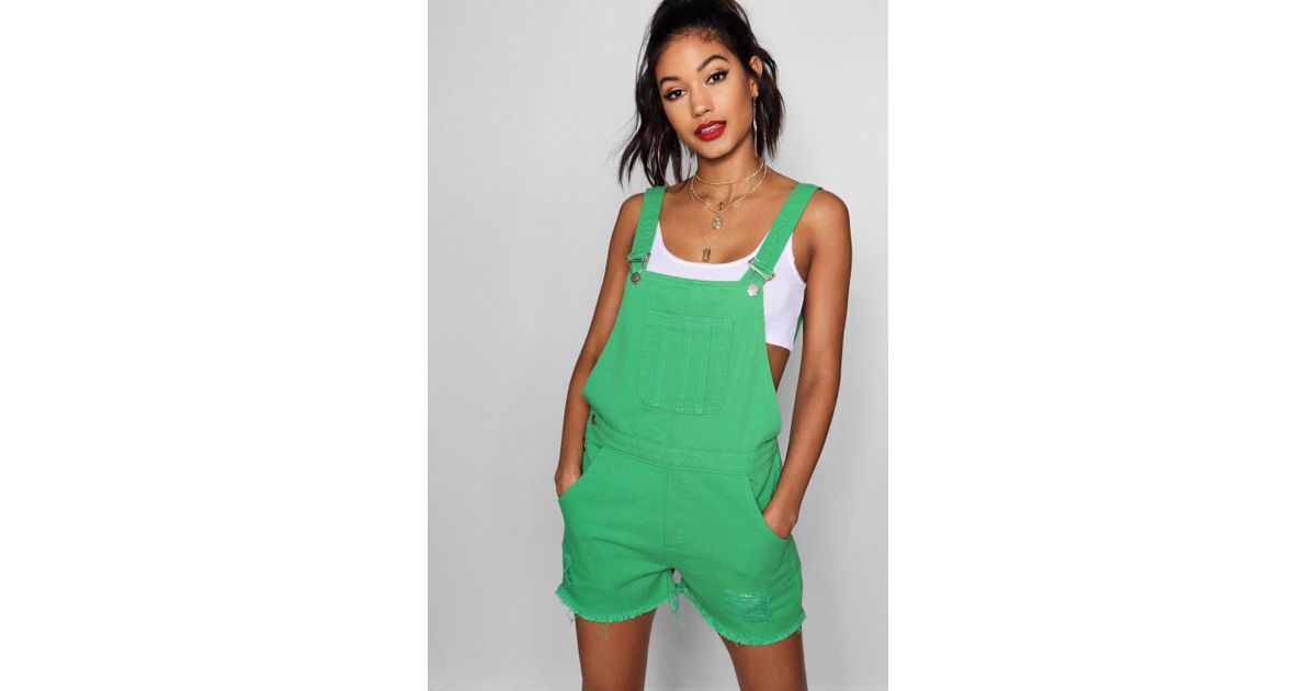 green dungaree shorts