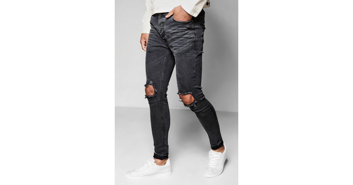 open knee black jeans