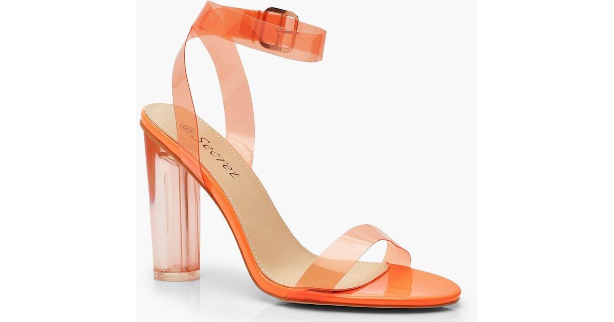 orange and clear heels