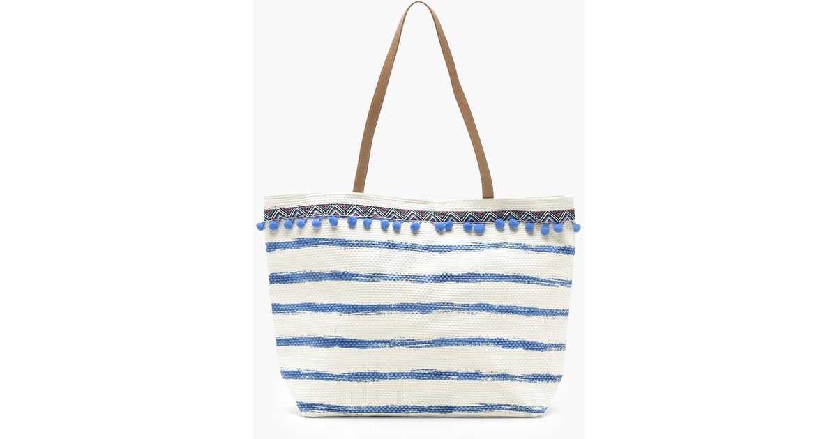 Lyst Boohoo Lily Pom And Stripe Straw Beach Bag In Blue