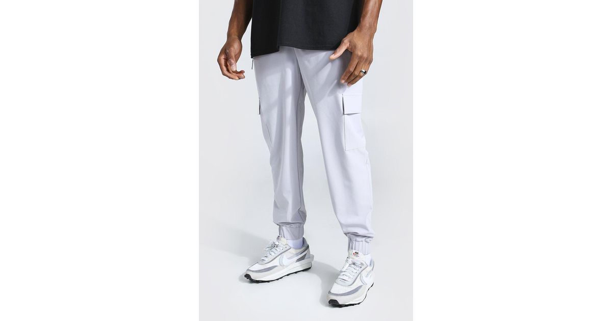 BoohooMAN Denim Stretch Shell Zip Pocket Cargo Jogger Pants in Grey (Gray) for Men - Lyst