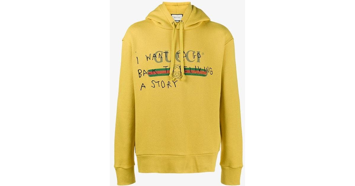 yellow gucci hoodie with writing
