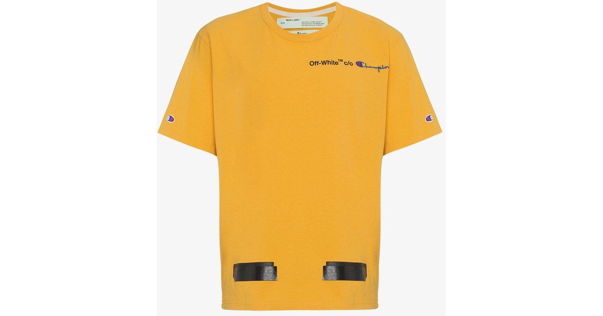 yellow and white champion shirt