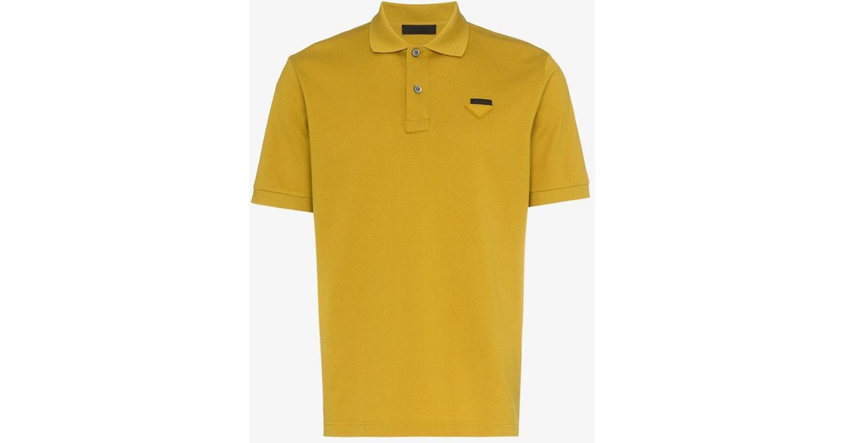 mustard yellow polo shirt