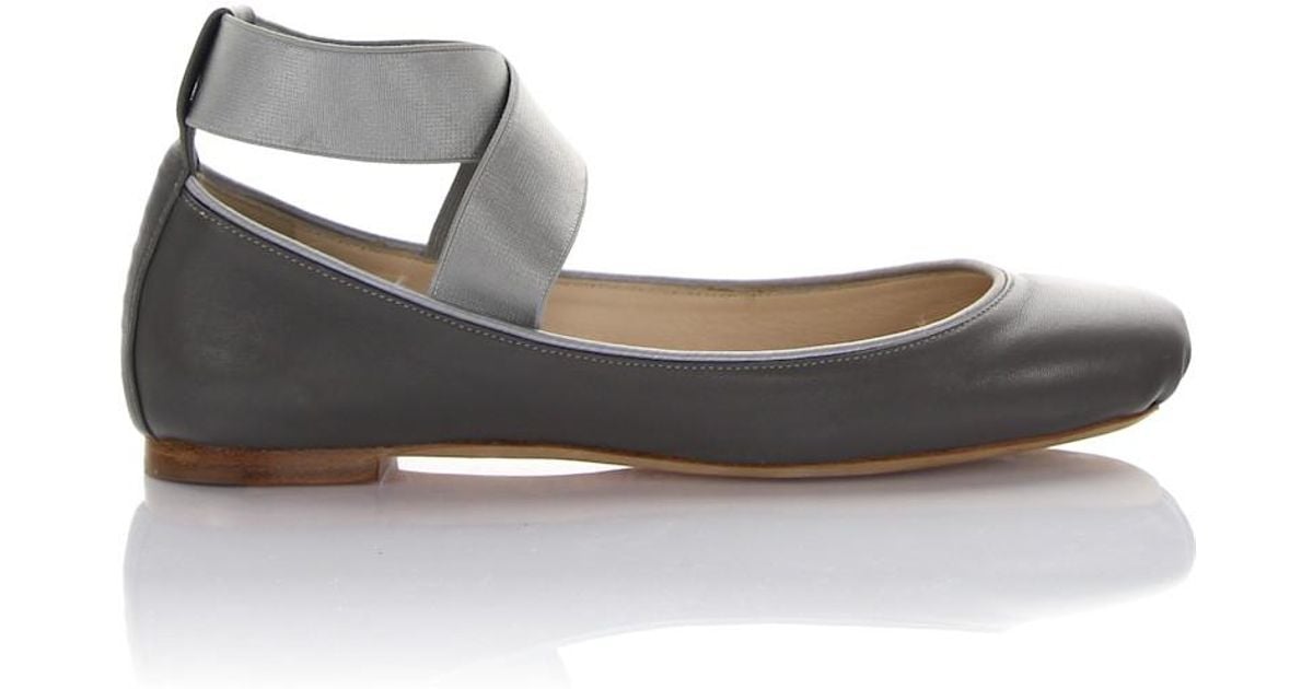 gray flats with ankle strap