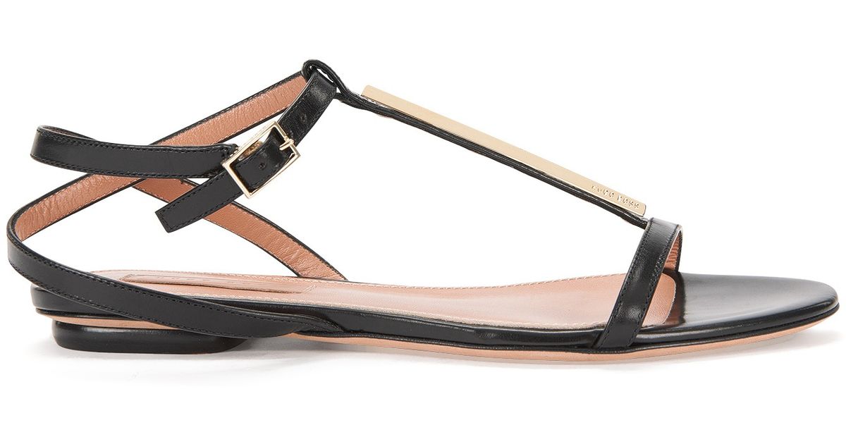 white t bar flat sandals
