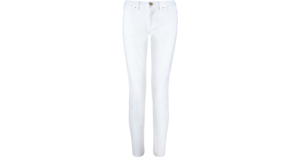 white ankle grazer jeans