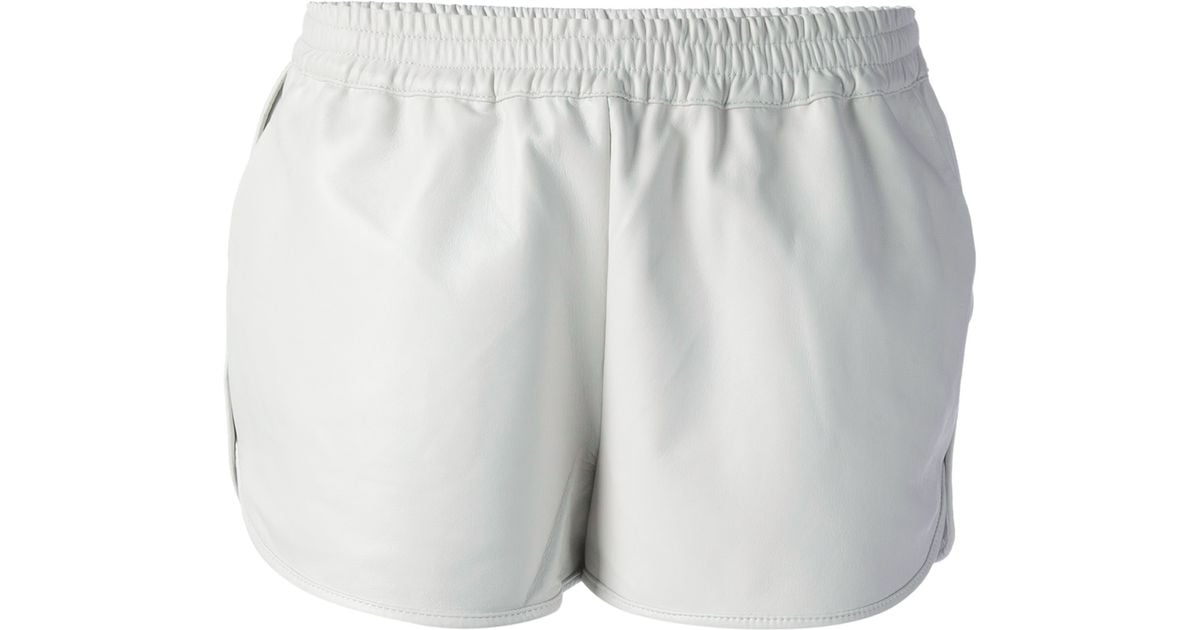 white leather shorts