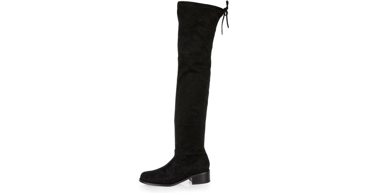 black boots with tie in back
