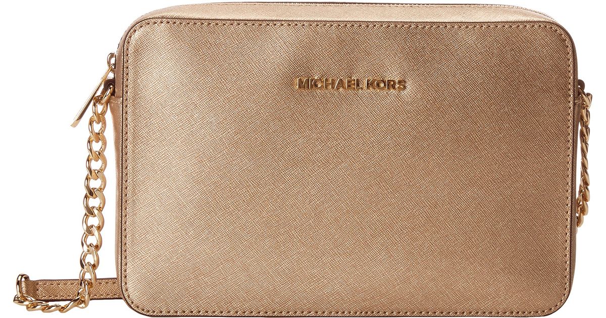 michael kors jet set travel lg ew crossbody gold black