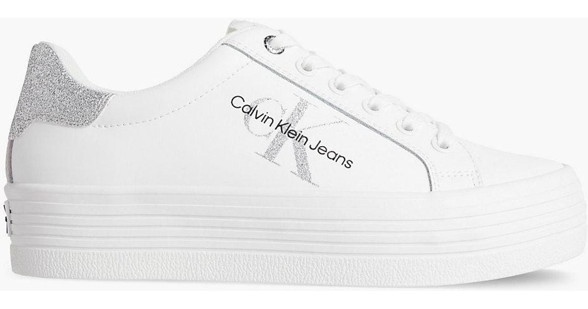 Calvin klein hotsell white platform trainers