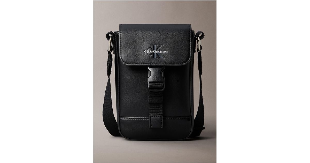 ショルダーバッグ・ポシェット   CK LOCK LONG FLAP PHONE CROSSBODY Calvin Klein Monogram Logo Flap Phone Crossbody Bag in Black