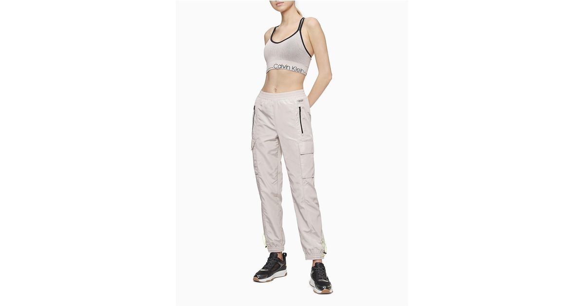 Buy Calvin Klein Jeans Women Off White Relaxed Fit Solid Track Pants -  Track Pants for Women 19008294 | Myntra