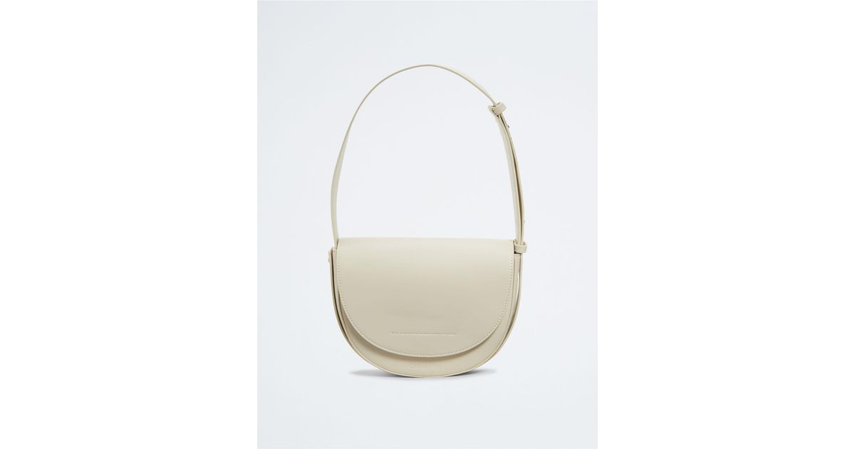 Calvin Klein Elemental Saddle Bag in White Lyst