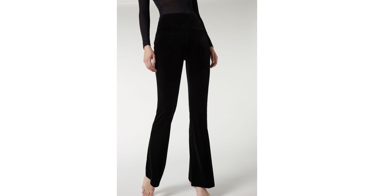 Leggings de terciopelo acampanados Calzedonia de Terciopelo de color Negro  | Lyst