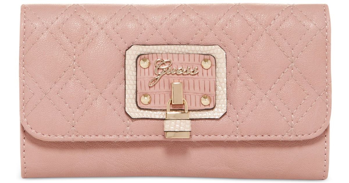 guess pink clutch