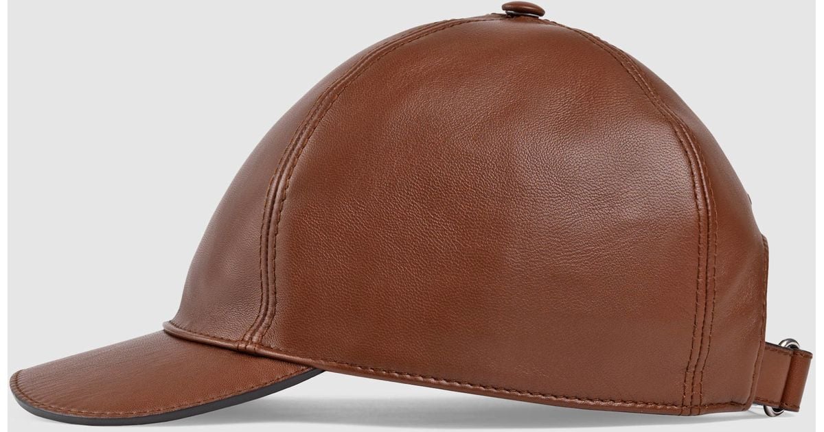 brown leather baseball cap