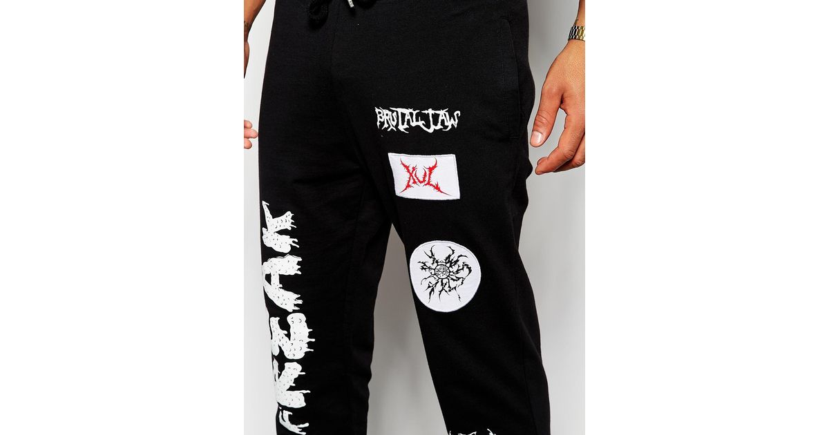 black sweatpants with designs