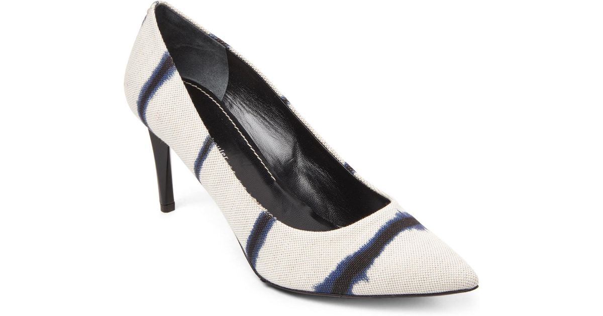 white canvas pumps
