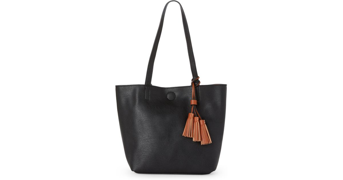 tote carlos santana purses