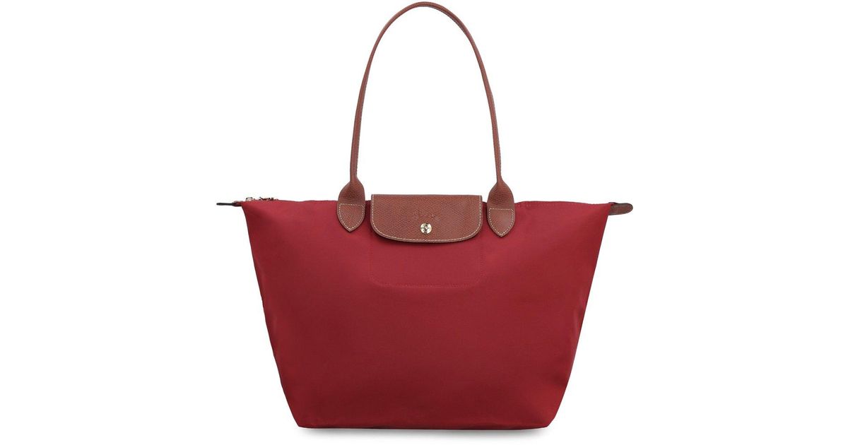Longchamp Le Pliage Top Handle Bag in Red | Lyst