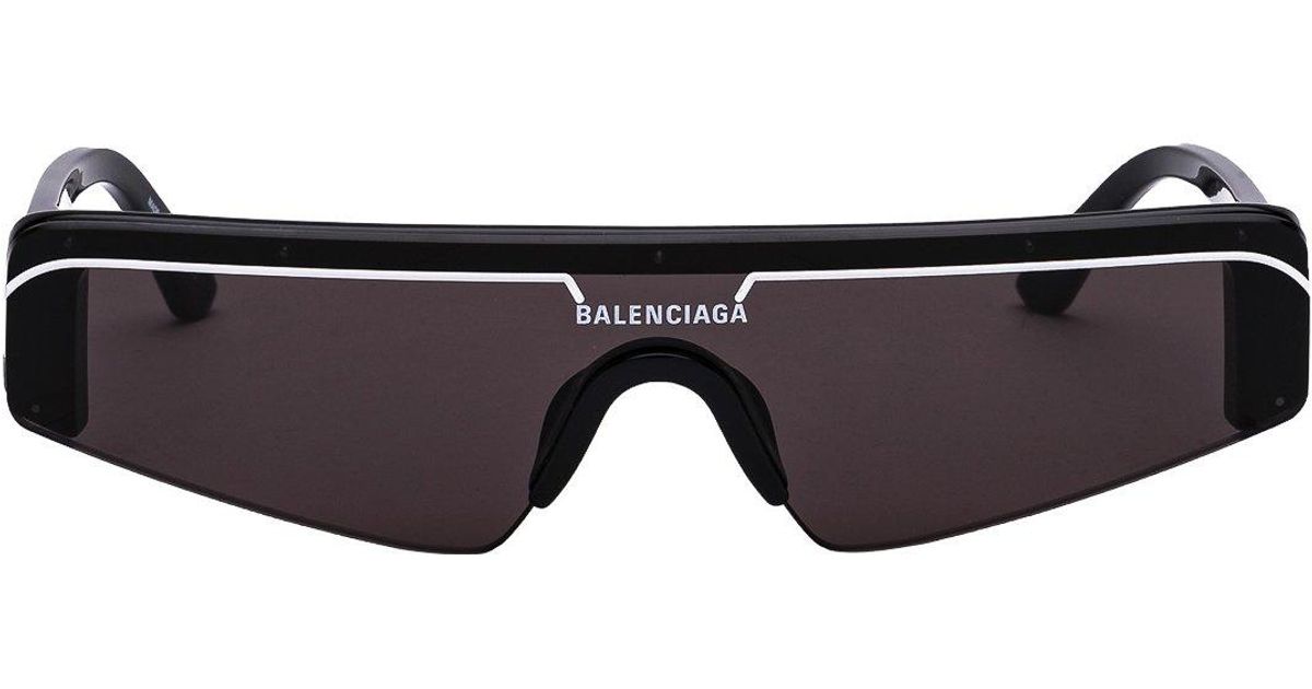 Balenciaga Logo Printed Biker Sunglasses in Black | Lyst Canada