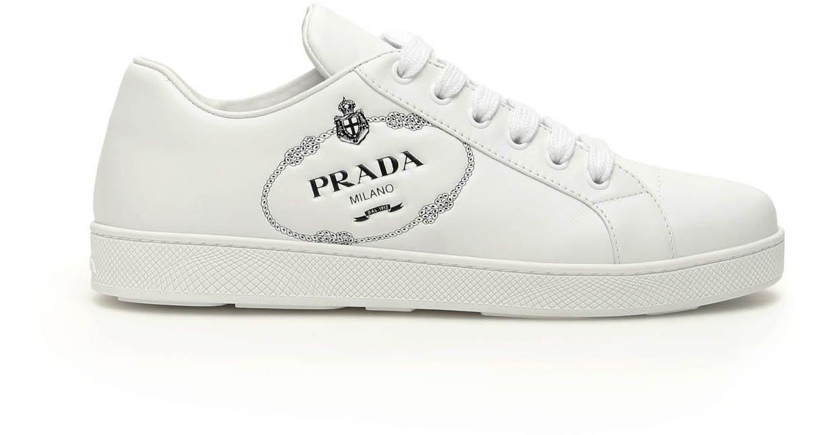 prada white sneakers with red stripe