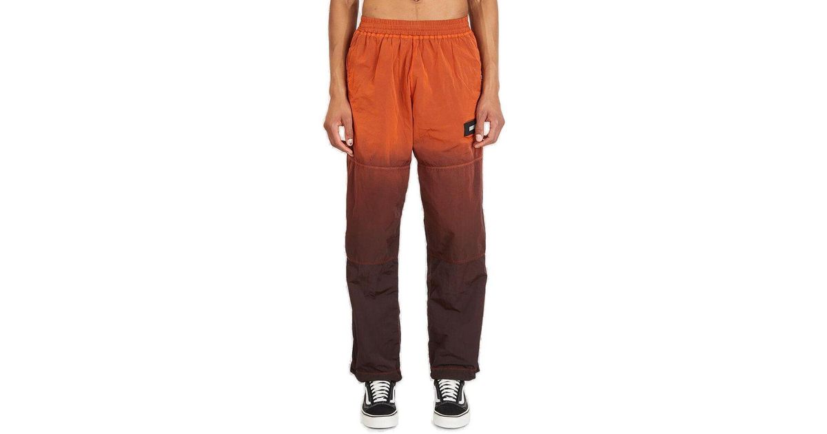 Womens Clothing Trousers Slacks and Chinos Straight-leg trousers Aries Spray-dyed Windcheater Pants in Orange 