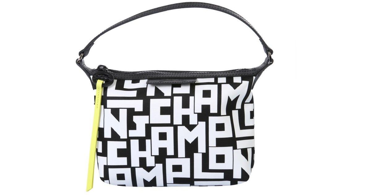 harga pouch longchamp original