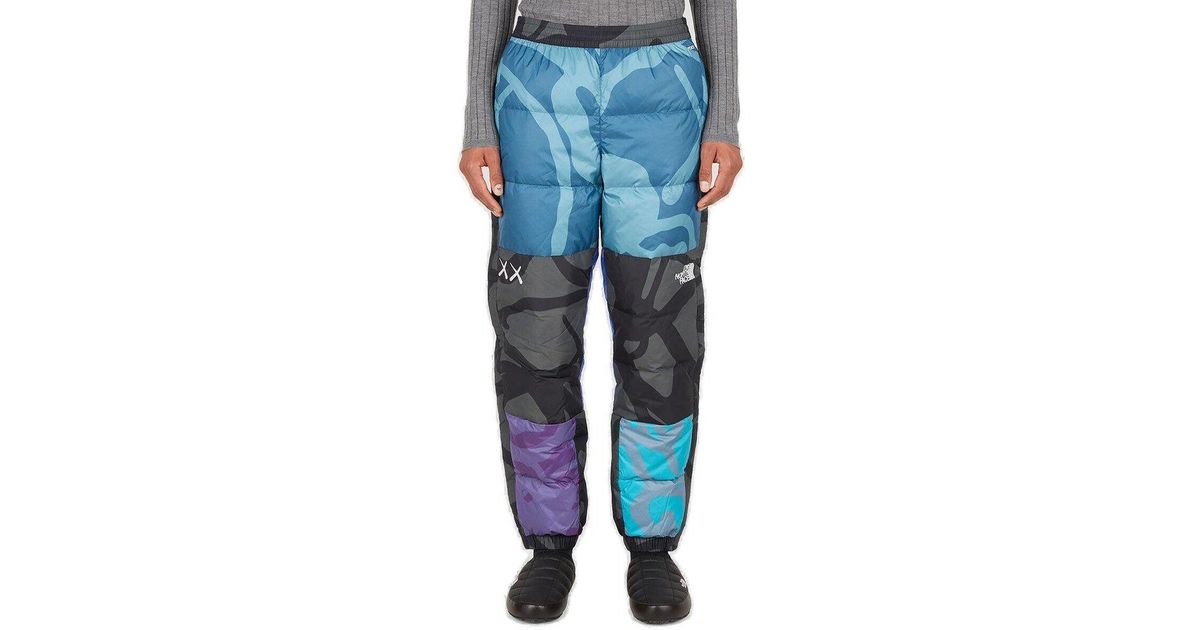 The North Face Synthetic X Kaws Retro 1996 Nuptse Pants in Blue for Men