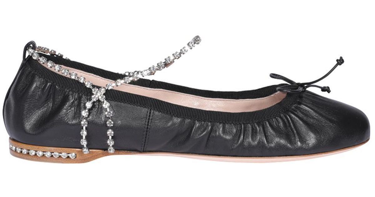 miu miu flats with crystal