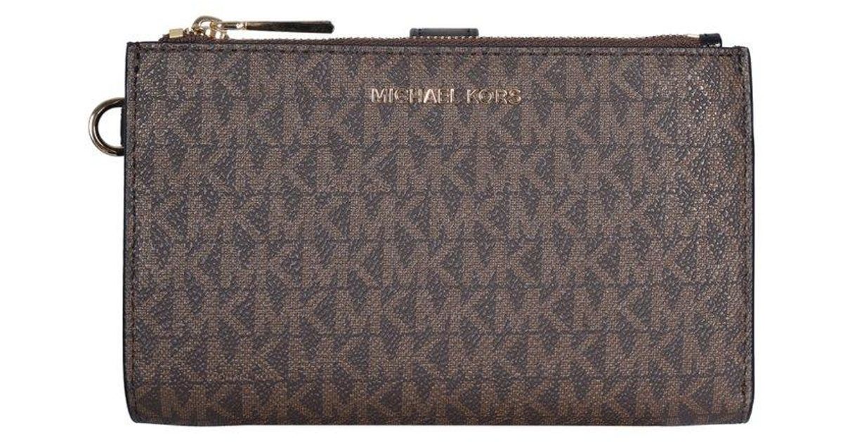 MICHAEL Michael Kors Leather Adele Zipped Clutch Bag in Brown | Lyst