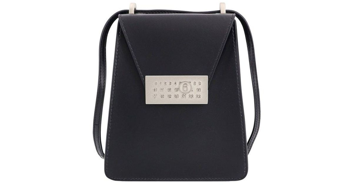 【MM6】Logo Buckle Backpack MM6 by Maison Martin Margiela Logo Buckle Backpack in Black