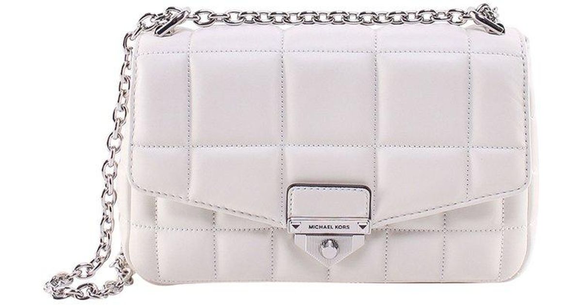 white quilted michael kors bag