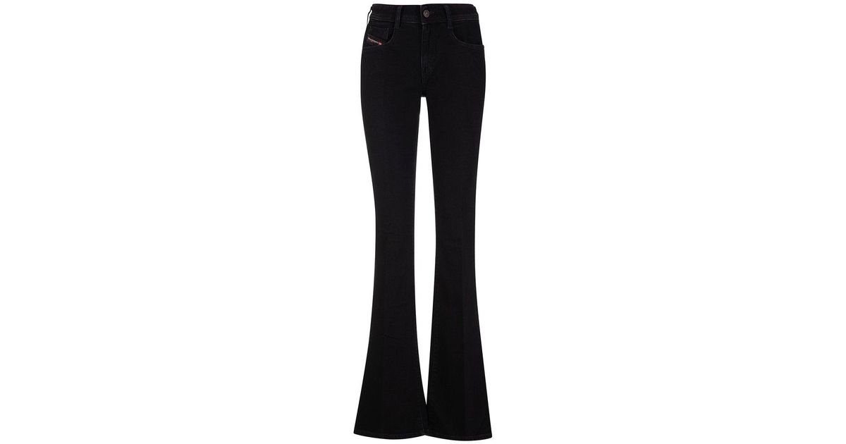 DIESEL Woman Black Denim Flare Jeans | Lyst